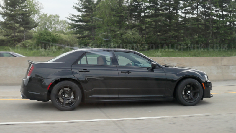Illustration for article titled What The Hell Is This Widebody Chrysler 300 SRT With Dodge Demon Wheels?